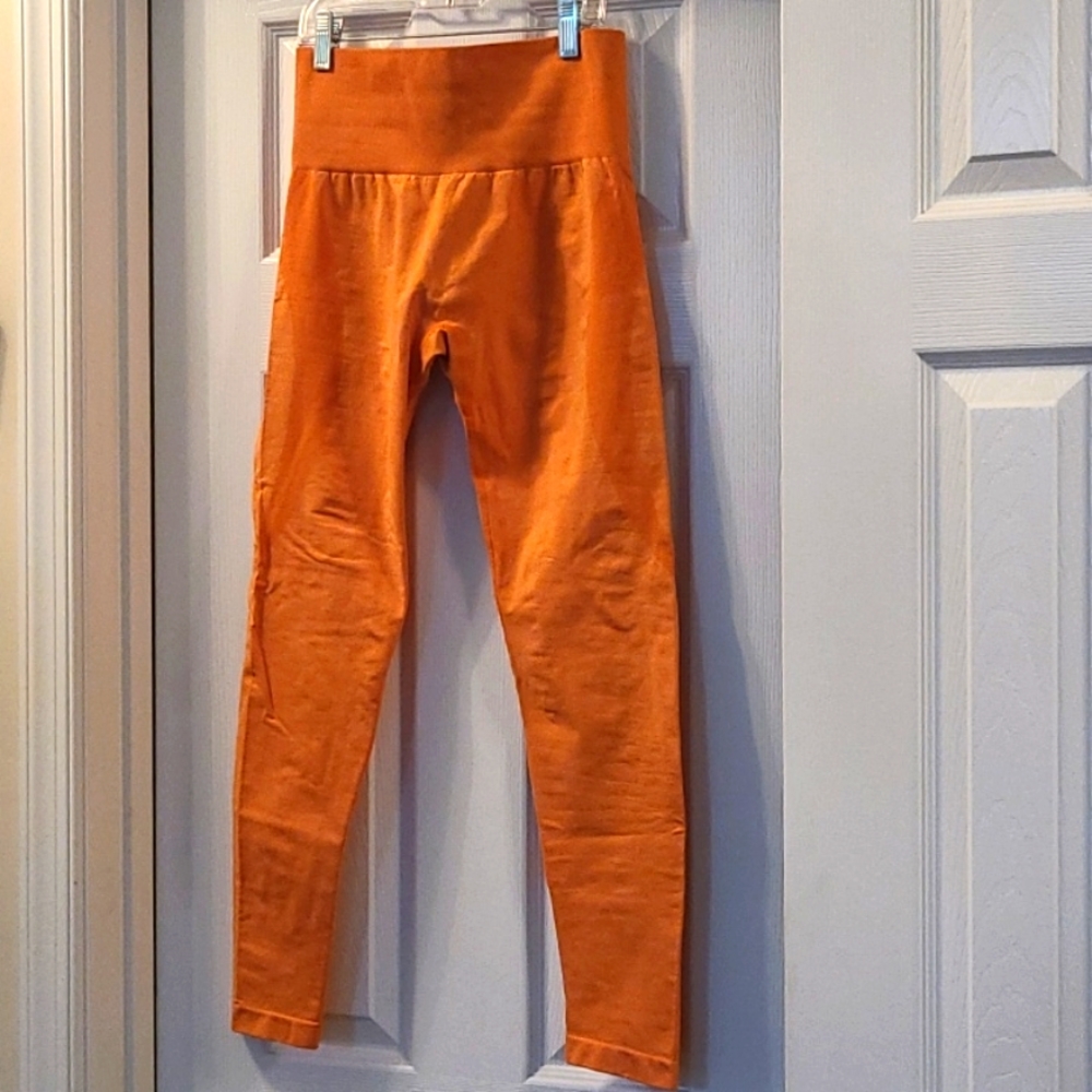 Nvgtn contour sunset orange leggings size medium 🍊